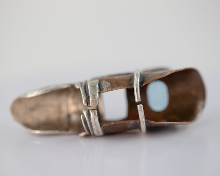Finger ring. Silver, bronze and blue zircone. / Pierscien palec, srebro, braz, cyrkonia.