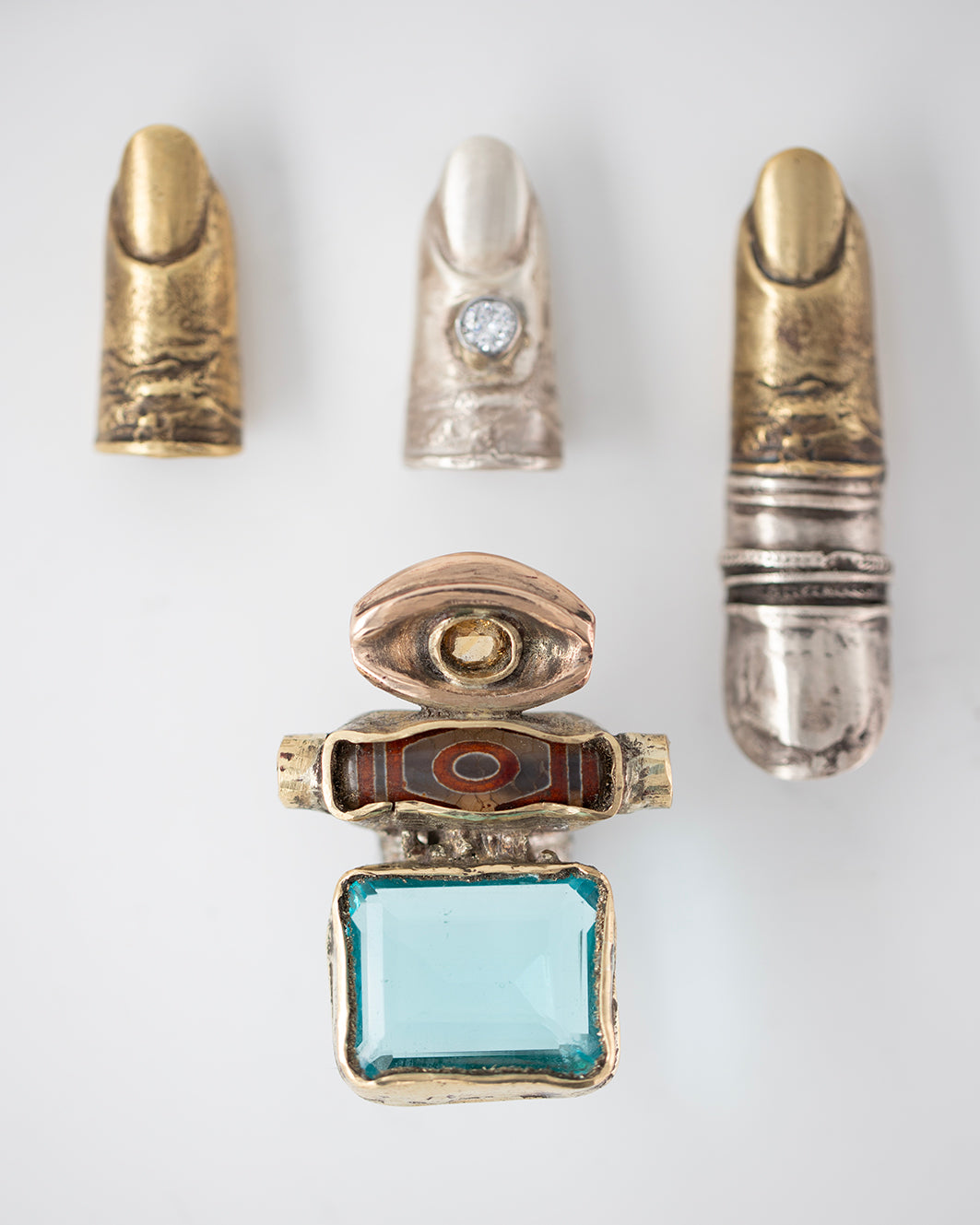 Big ring Dzi. Brass, bronze, silver, laboratory topaz, natural citrine, 2 turquoises./ Wielki pierscien Dzi. Mosiadz, braz, srebro, topaz laboratoryjny, naturalny cytryn, 2 turkusy.