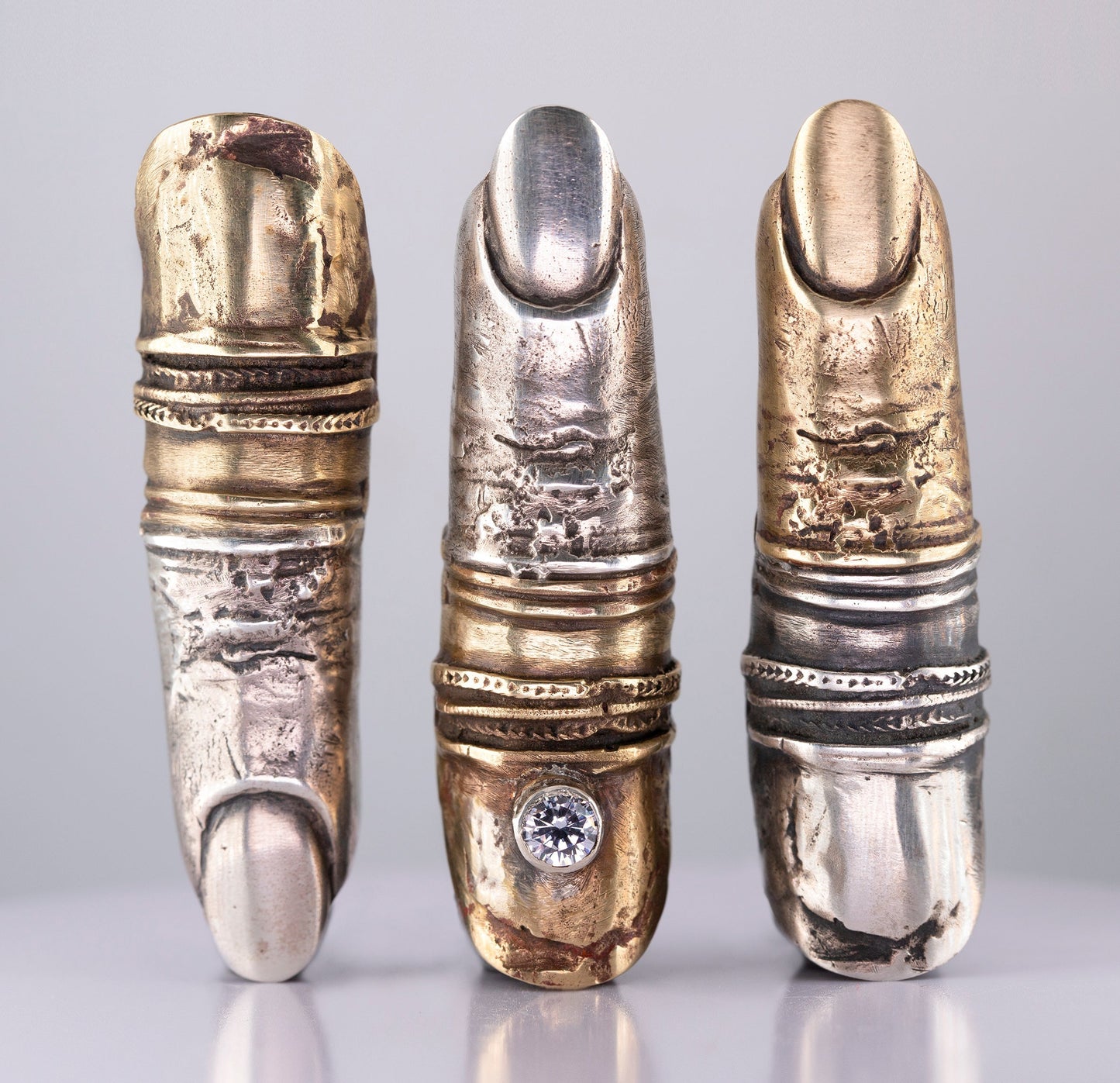 Raw Finger 2 colors - brass and silver, cubic zirconia. / Pierścień palec. Mosiądz i srebro, cyrkonia.